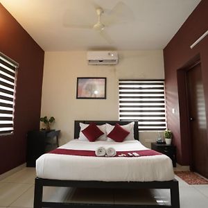 Atmos Inn Kozhikode